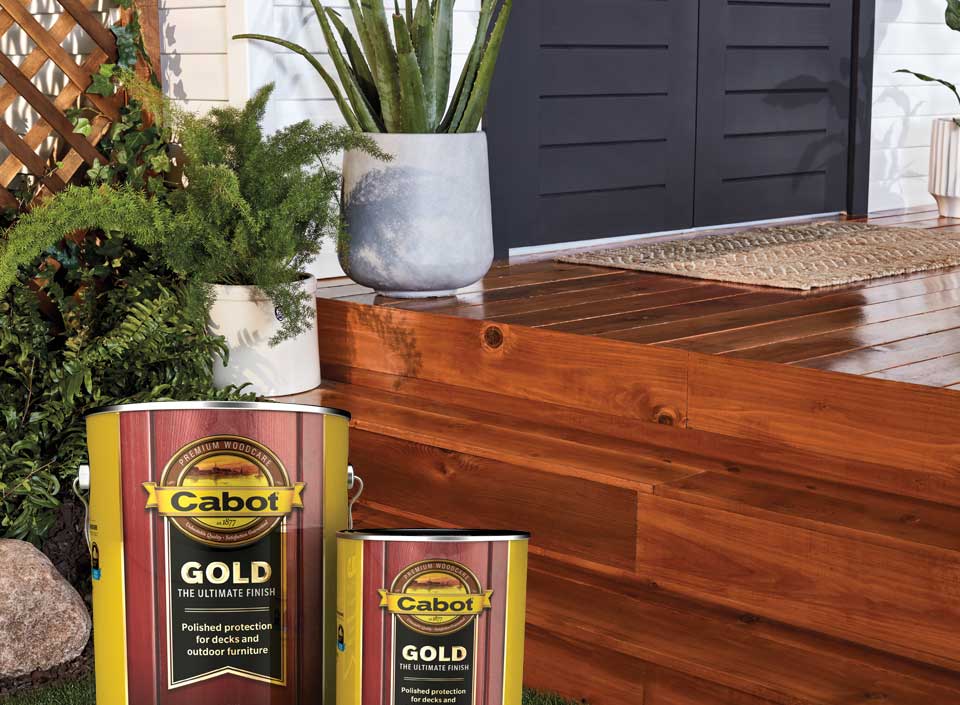Cabot Gold cans and stained deck