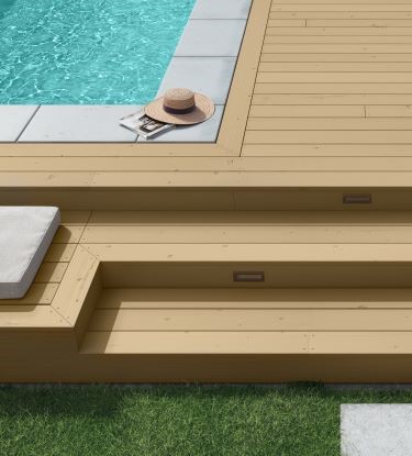 modern deck next to pool