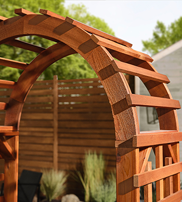 stained wooden arch/arbor